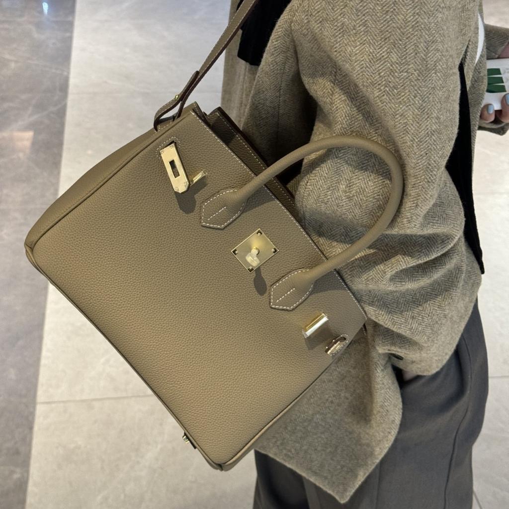 Borsa di alta qualità togo con motivo litchi color platino moda europea e americana borsa a tracolla messenger borsa a mano transfrontaliera donna