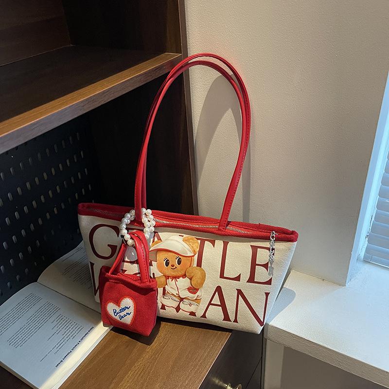 Large capacity bear letter tote bag women's new niche canvas bag versatile commuter tutoring bag