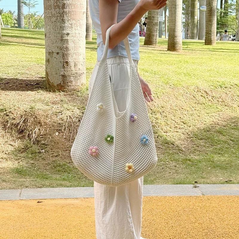 Hollow woven bag women's large capacity summer seaside vacation wind relaxation flower beach leisure bag