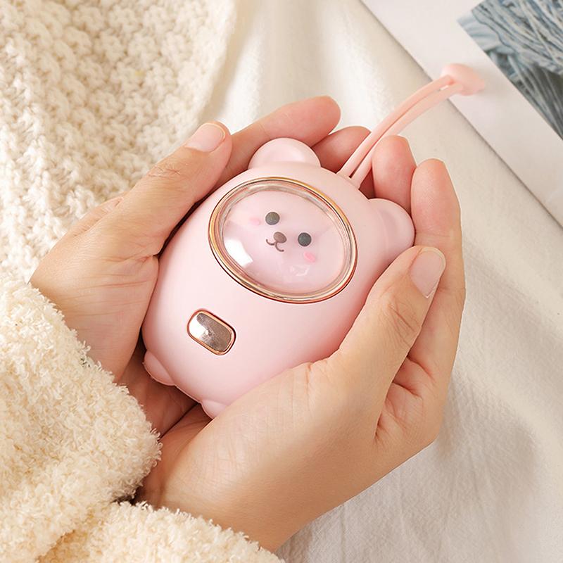 Calentador de manos portátil de 1200 mAh con forma de oso para manos de mujer y pies de bebé. Calentador de manos de invierno con 3 horas de duración de la fiebre.
