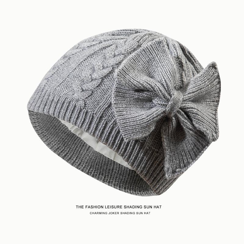 Children's knitted hat wool hat cold-proof and warm bow cute versatile pullover fleece knitted cold hat tide