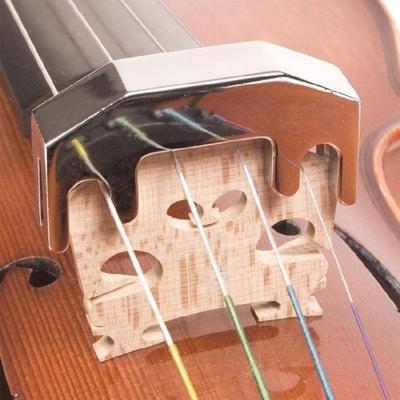 Sourdine d'étude pour violon en alliage de zinc. Installation rapide pour étudiants et professionnels. Atténuation sonore efficace. Fixation facile.