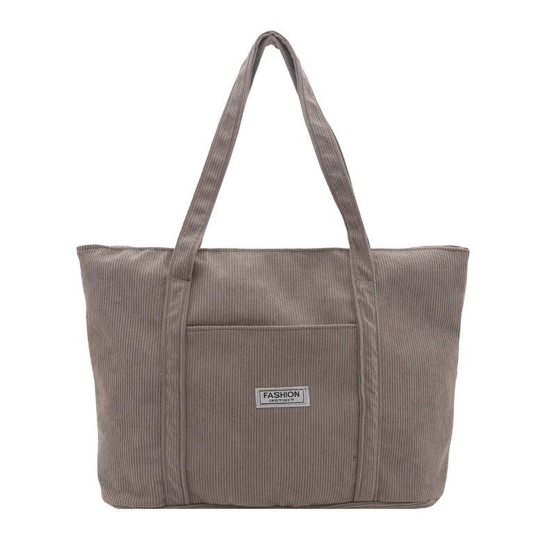 Casual simple portable tote bag women's autumn new largecapacity shoulder bag commuter casual armpit bag