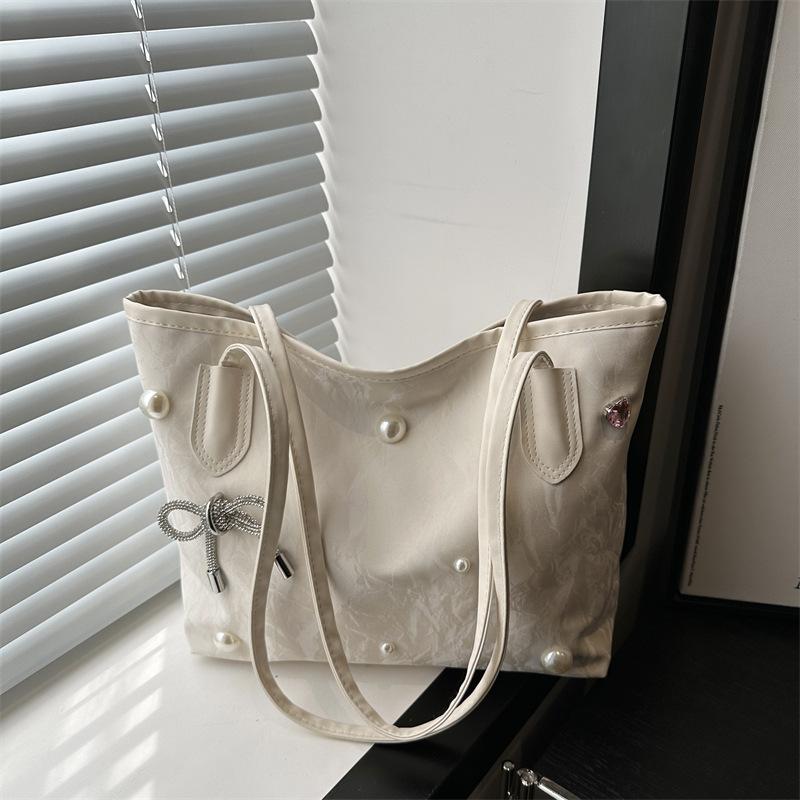 

Новая сумка для通勤, популярная сумка на плечо/подмышку, сумка-тоут премиум-класса с жемчужным бантом, большая вместимость, женская сумка белый