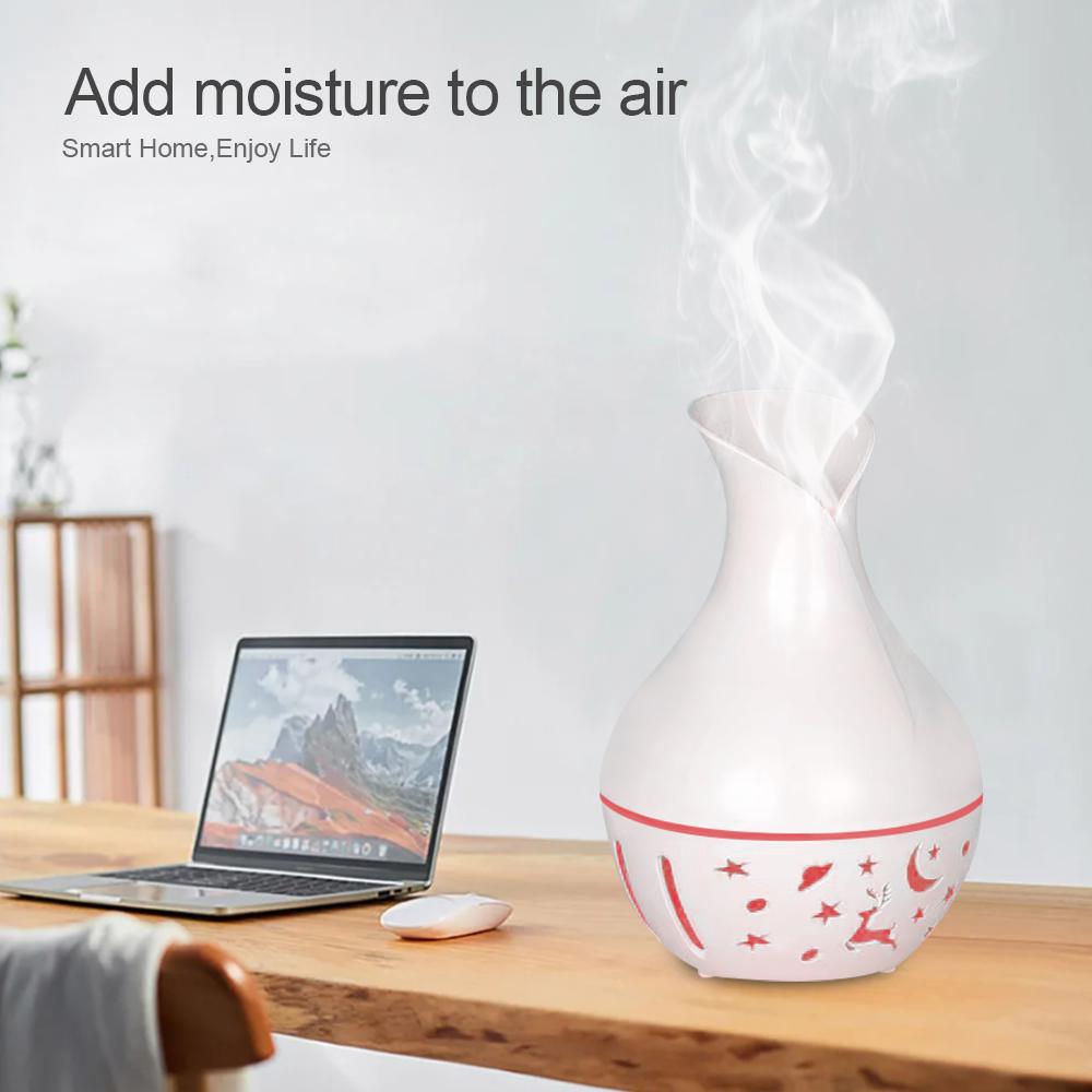 USB Desktop Air Humidifier Ultrasonic 200ML Essential oil diffuser Cold mist Air moisturizer  and two bottles of essential oil.