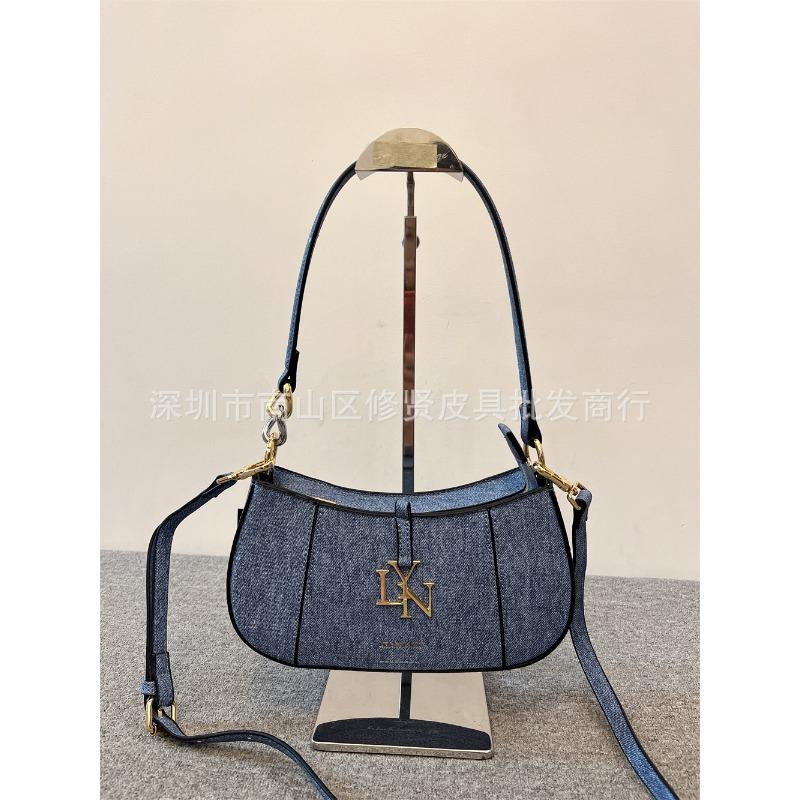 

LYN ACCS new armpit bag splicing baguette bag portable shoulder messenger women s bag джинсовий синього кольору