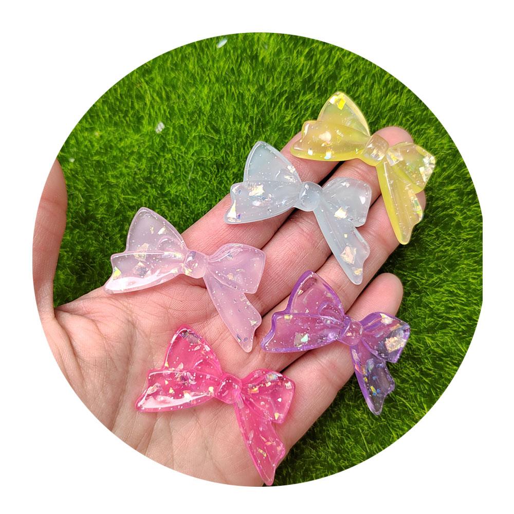 100PCS Glitter Transparent Shiny Resin Bowknot Flatback Cabochon Scrapbook DIY Children Hair Clip Plastic Bowknot Accessories 100PCS/bag