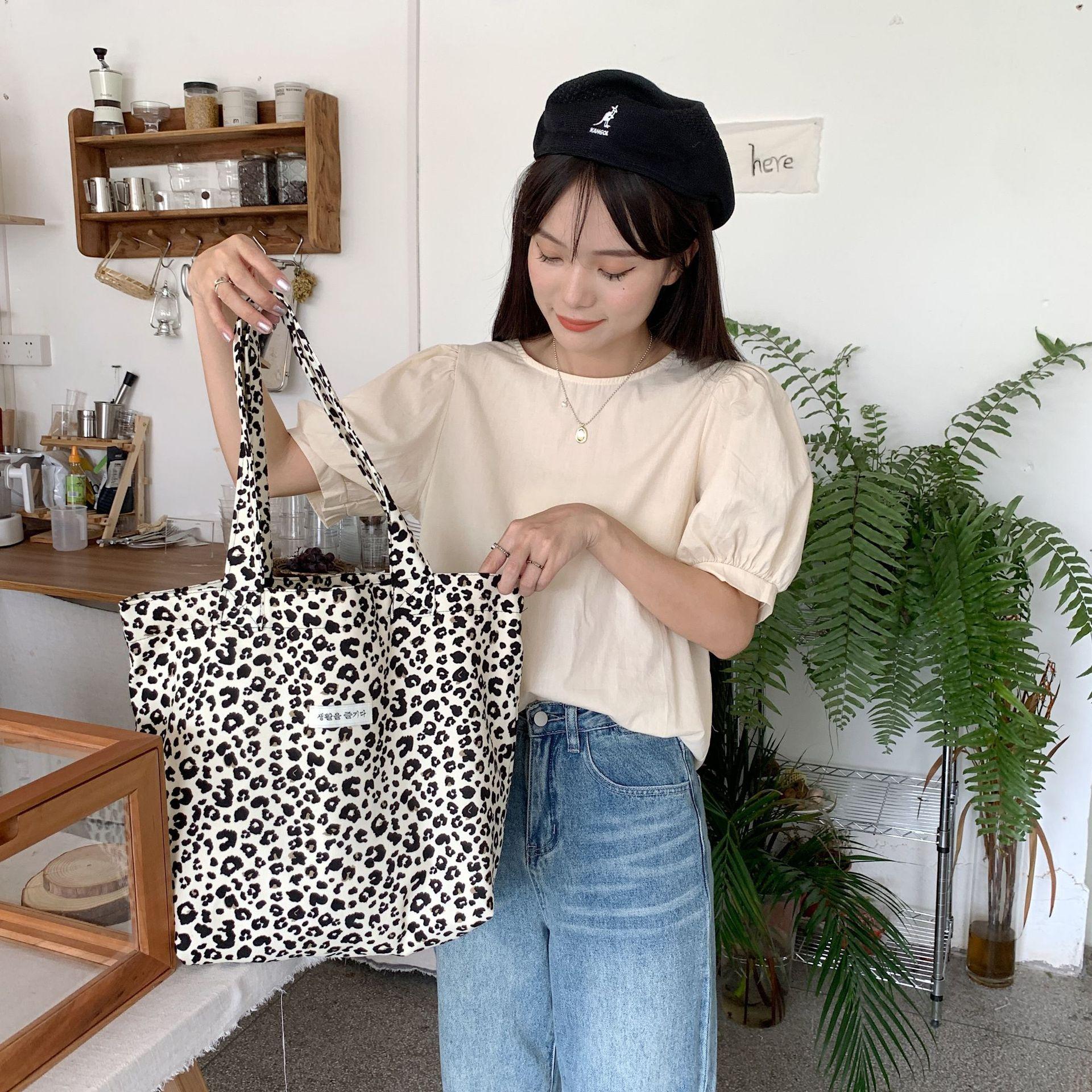 

Женская осенняя новая винтажная леопардовая сумка большой емкости, холщовая сумка