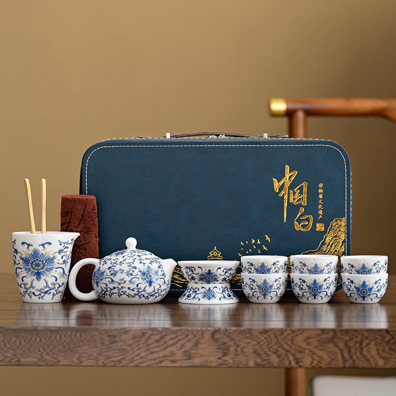 High-grade white porcelain tangled lotus tea set, household ceramic kung fu tea set, Xishi pot light luxury leather bag annual meeting gift