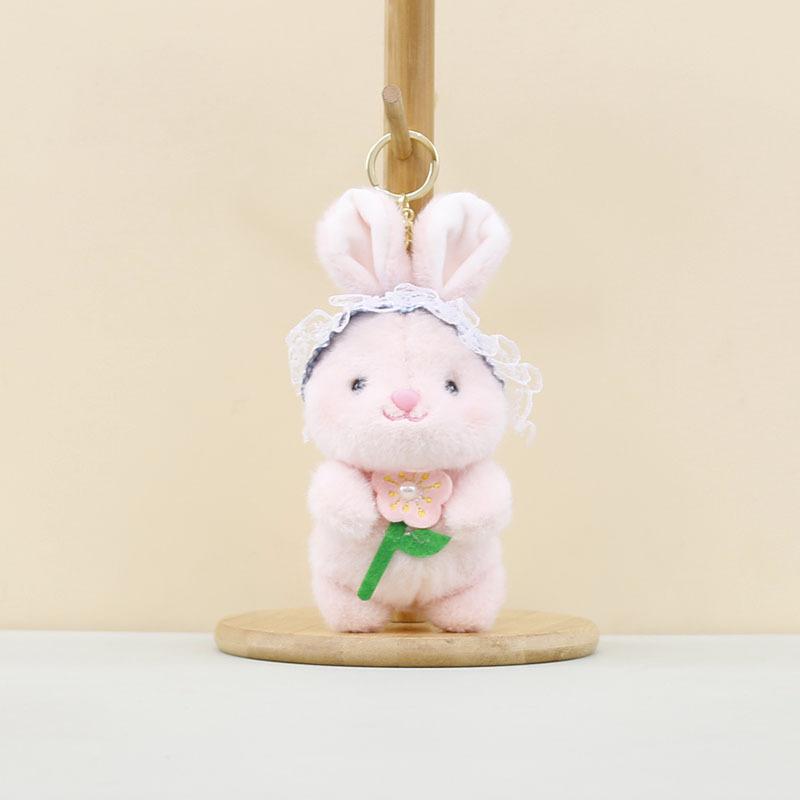 

Fluffy Bunny Keychain With Cute Flower Holding Design Perfect For Animal Lovers Gifts рожевий