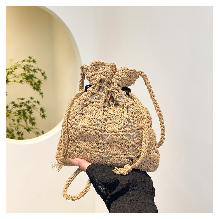 

Niche design bag 2025 new women s bag versatile messenger bag popular hollow bucket bag хаки