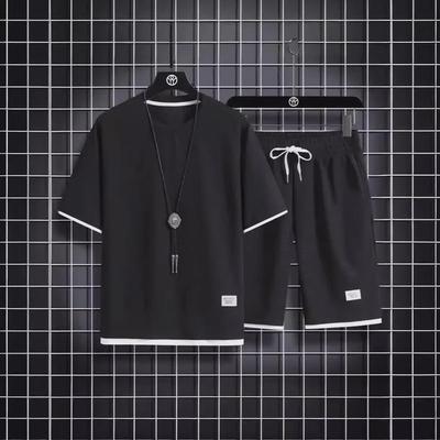 Herren Koreanischer Stil Sommer Waffel Sportbekleidung Zweiteiler: Lässiges Kurzarm-Top und Shorts.