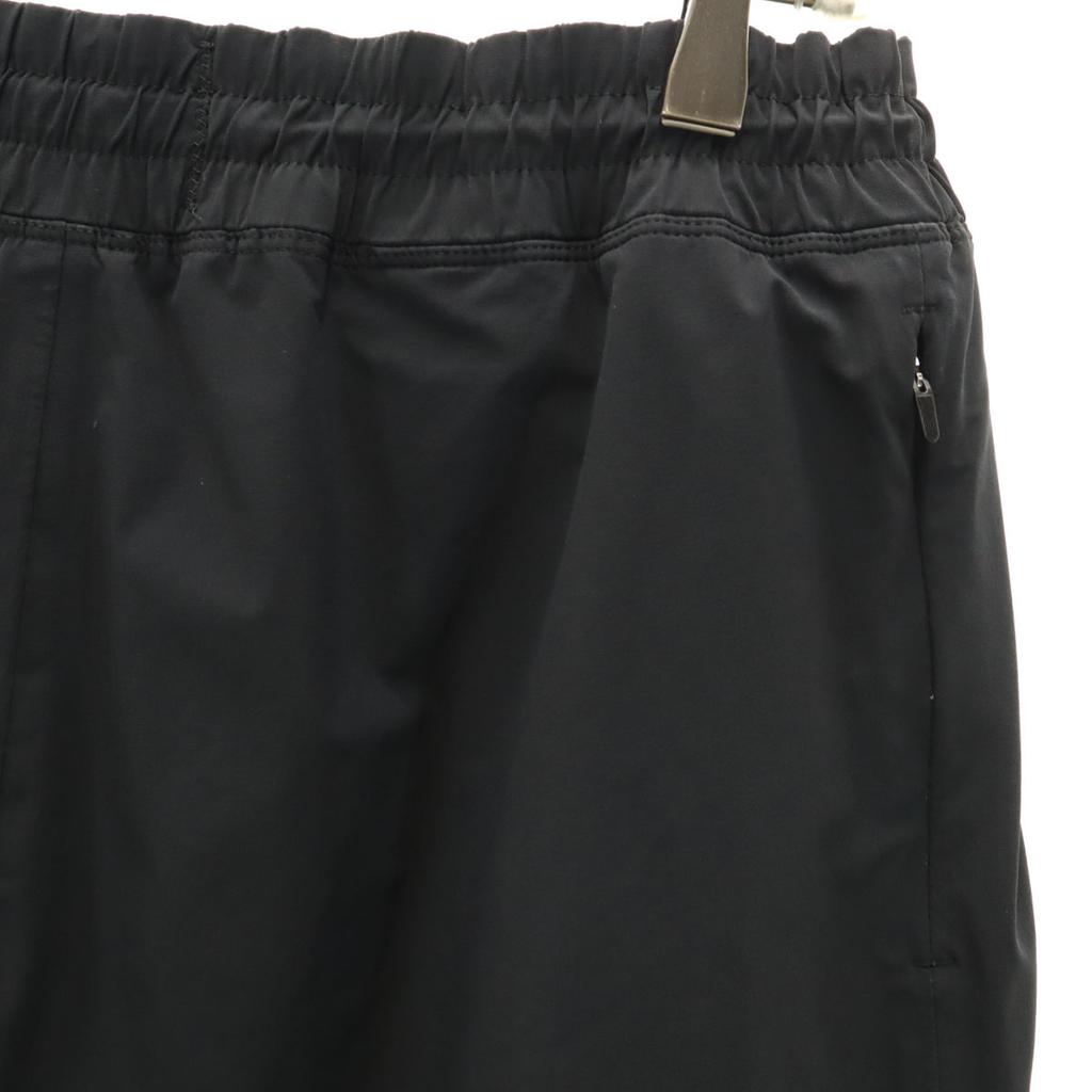 REIGNING CHAMP Spodnie wiatrówki L czarne Męskie Używane