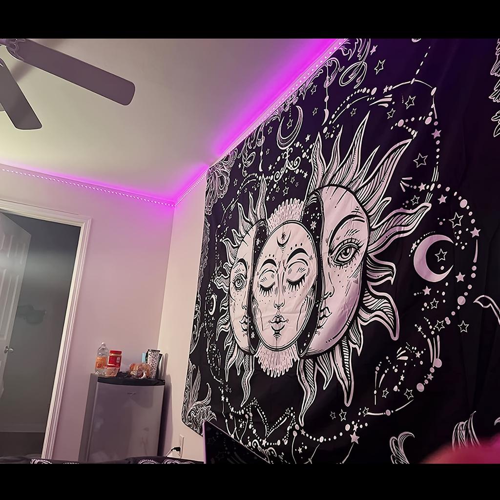 A Large Fantasy Mandala Flower And Plant Tapestry Adorned With Eyes And a Background Cloth Burning In The Sun home decoration