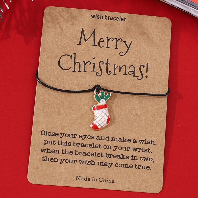 

Популярный рождественский браслет-открытка: Простой и креативный дизайн с рождественскими символами на черном плетеном шнурке