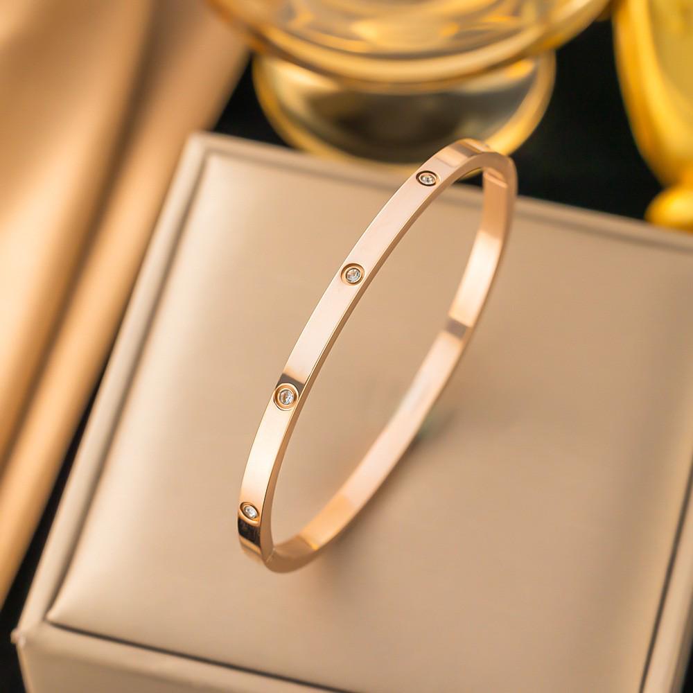 Bracciale da donna in acciaio al titanio con diamanti, placcato oro, non sbiadisce, intarsio di zirconi, alta gamma, semplice, versatile gioiello in acciaio inossidabile