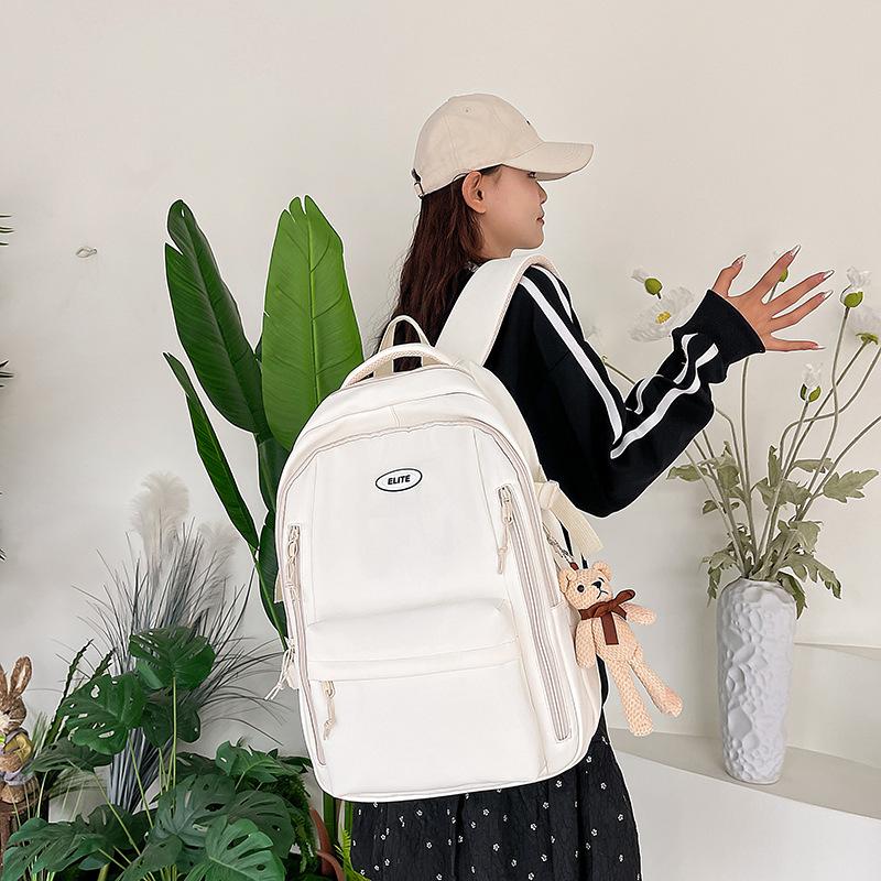 Schoolbag new schoolbag simple, lightweight and versatile large-capacity backpack junior high school student college student niche fashion backpack
