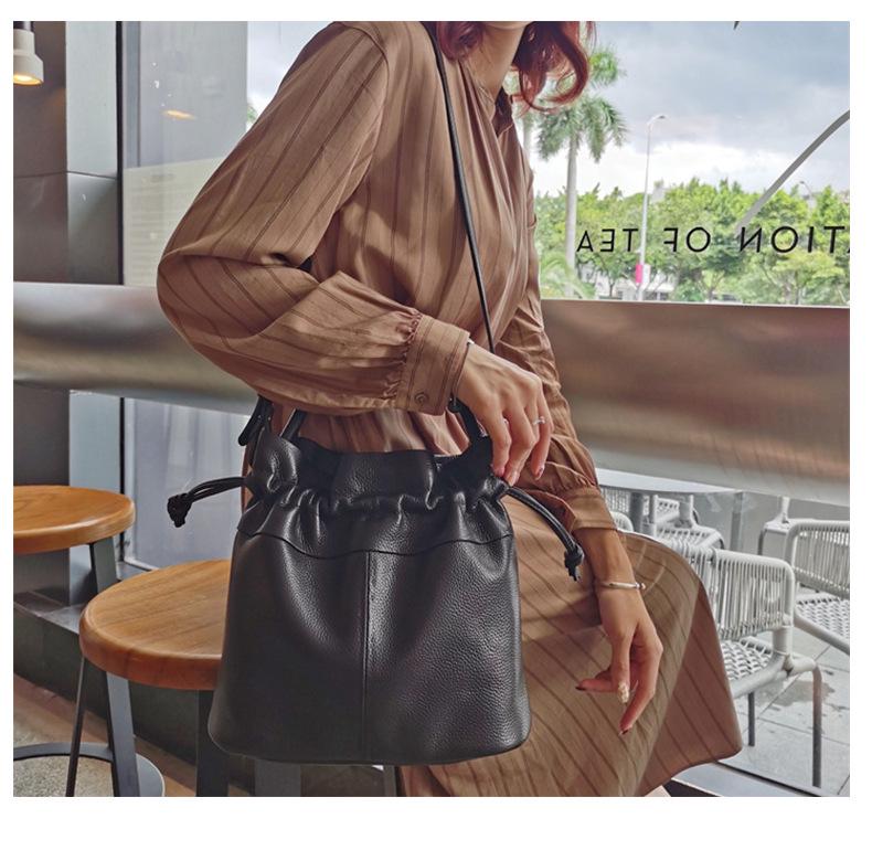 Women's Classic Fold Leather Bucket Bag: New Style, First Layer Cowhide, Trendy Solid Color Handheld Design