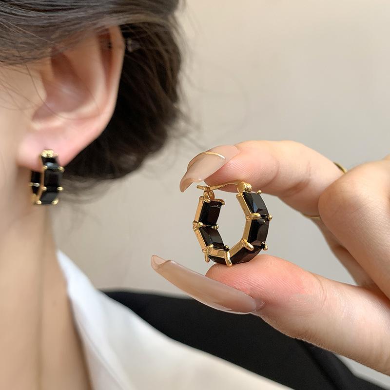 

Real gold electroplated exquisite rhinestone ring earrings women s light luxury high-end ear buckles unique niche design temperament earrings