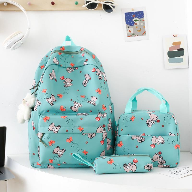 School bag new cute cartoon nylon backpack women's large-capacity middle and high school burden reduction wear-resistant school bag three-piece set