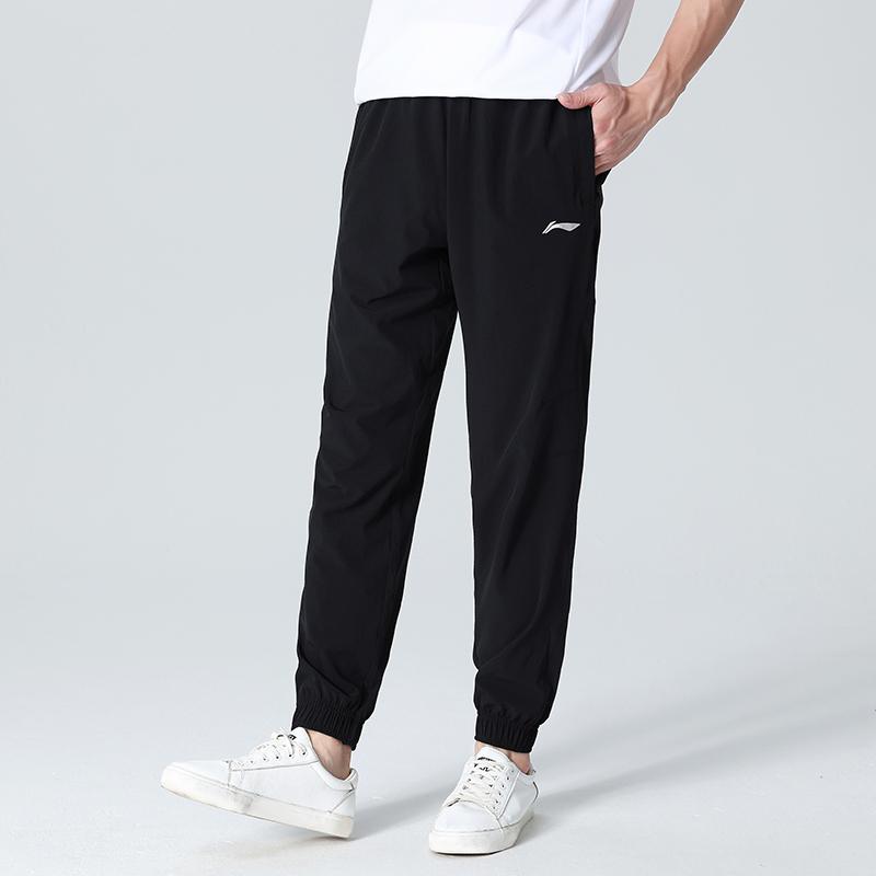 Li Ning Sports Pants Fashion Trendy Versatile Breathable Casual Quick-Dry Tapered Long Pants Unisex pants AYKT815