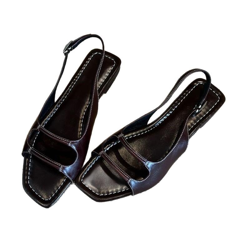 Cowhide version~ niche open-toed flat-soled Roman sandals women's 2025 summer beach leisure after trip strap cool slippers