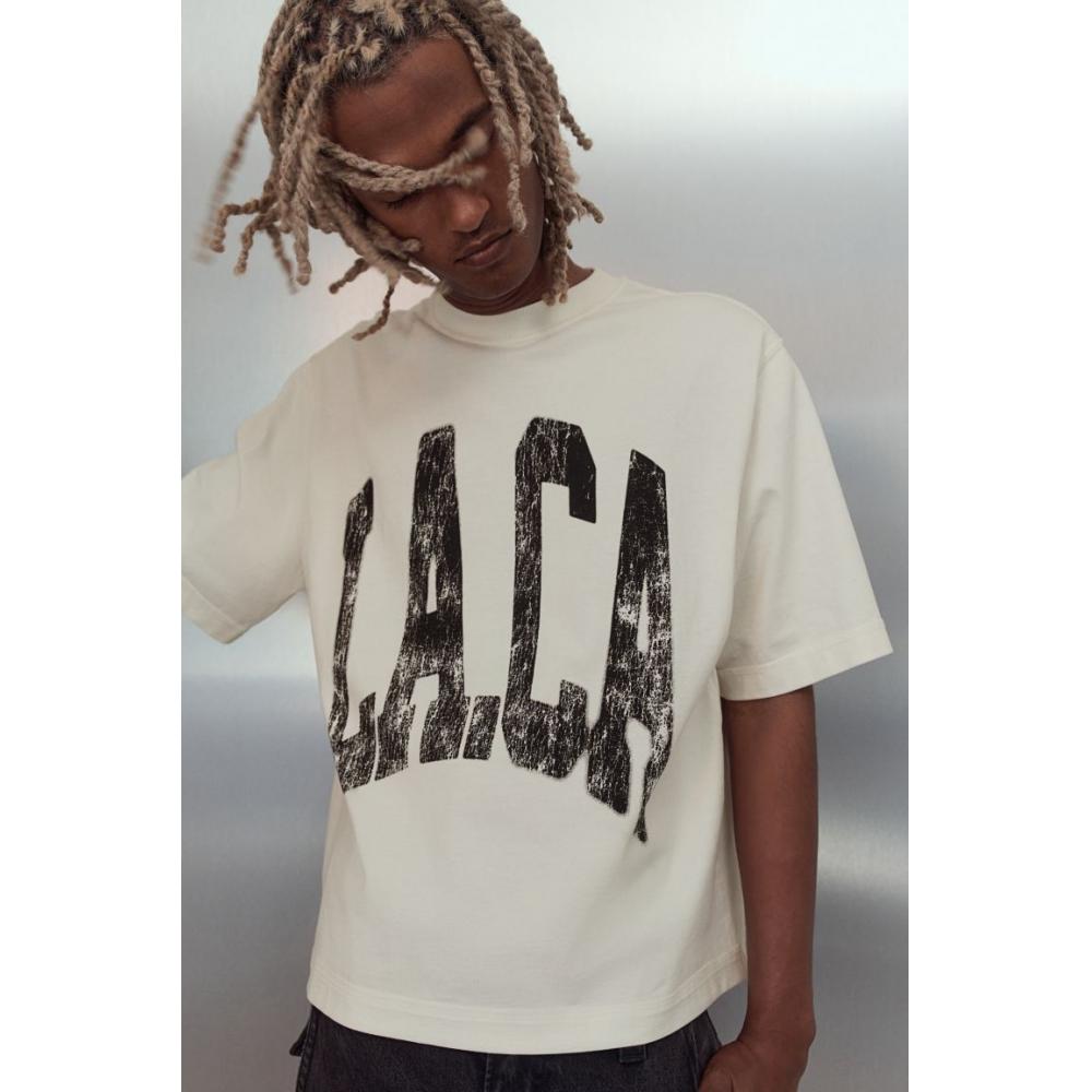 

Футболка свободного кроя с принтом HM Cream LA XXL