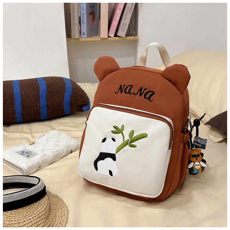 The new schoolbag is high-value, fresh, sweet and cute, red panda backpack, kindergarten level 1-3 large-capacity backpack.