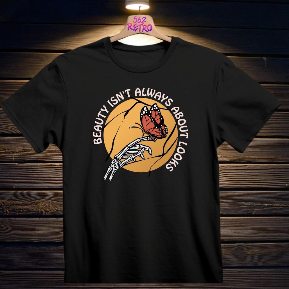 

Beauty Isn039t Always About Looks TShirt Black S3XL Unisex T-Shirt XXXXL