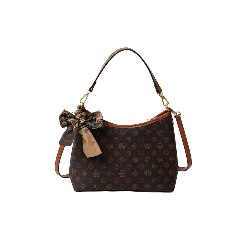 Premium väska dam 2024 ny trendig mode retro tryckt tygväska stor kapacitet mångsidig axel messenger väska