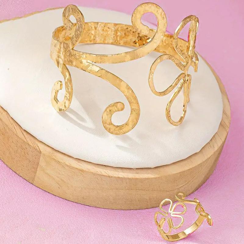 Set of Creative and Unique Design Sense Hollow Leaves Flower Lines Women's Opening Bracelet Ring Versatile Model