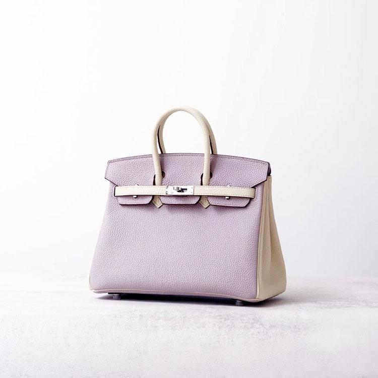 Høykvalitets spesiallaget semi-vokset tråd semi-håndsøm stålbeslag importert togo toppnarvet kuskinn håndveske med en følelse av luksus