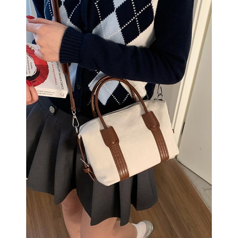 

Retro portable canvas bag women s bag 2025 new fashionable large-capacity pillow bag simple and versatile messenger bag