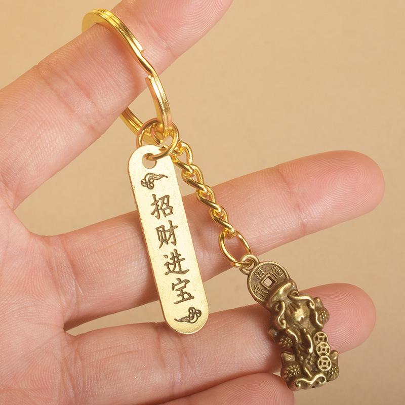 Nøkkelring, Lommebok, Baifu-krukke, Eple, Pixiu, Støvbrett, Buddha-amulett, Bilnøkkelanheng, Naturskjønt suvenir, Gatebod, Nattmarkedsartikkel.