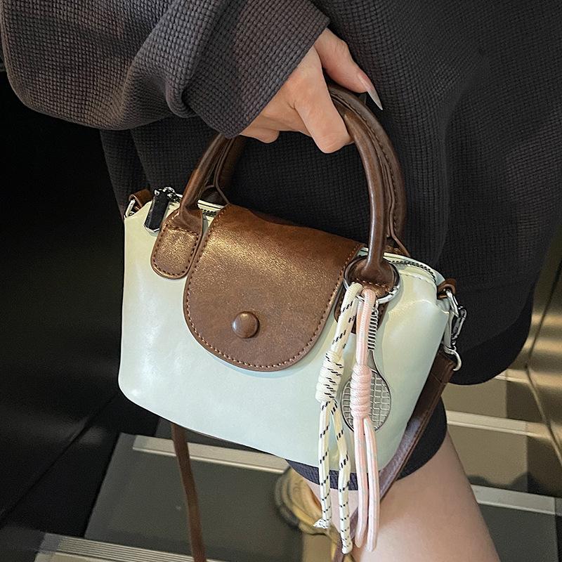 2025 new niche retro contrasting colors high-end portable dumpling bag versatile commuter daily casual messenger women's bag