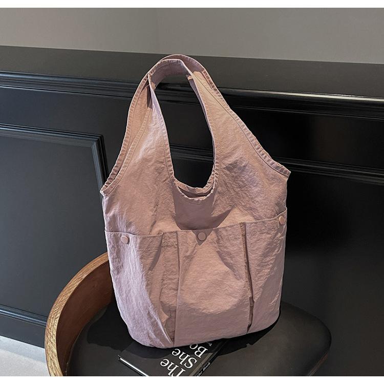 

Pleated three-pocket shoulder bag, commuter underarm bag, large-capacity commuter tote bag, tote bag, bag for women розовый