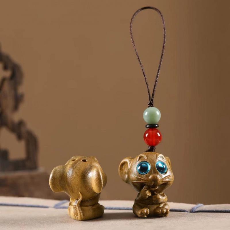 Twelve Zodiac Animal Charms Green Sandalwood Set: Rat, Ox, Tiger, Rabbit, Dragon, Snake, Horse, Sheep, Monkey, Rooster, Dog, Pig.