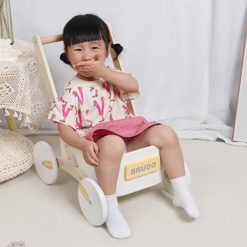 Multifunctional Baby Walker: Wooden Pull-Along Toy for Early Learning and Storage Habits.