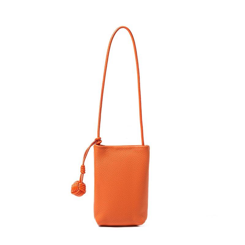 Hot-selling women's bags, high-end commuting versatile messenger bags, change bags, mobile phone bags, small bags, vertical leather mobile phone bags.