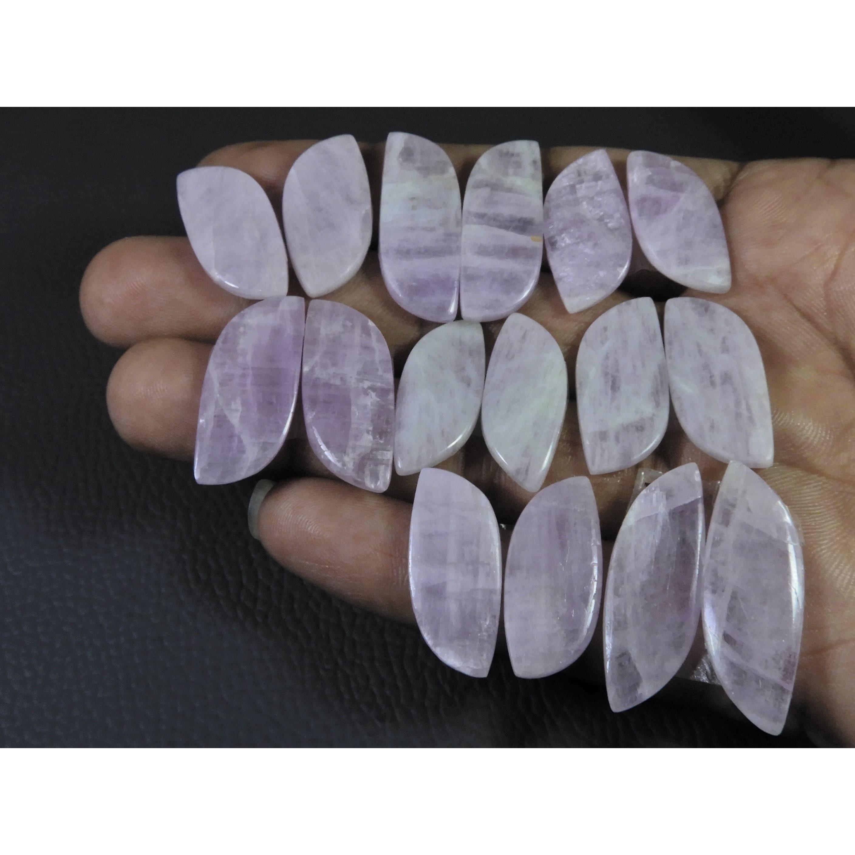 

192 карата. Натуральный розовый кунцит, парный, фантазийный кабошон, лот из 8 пар C-394