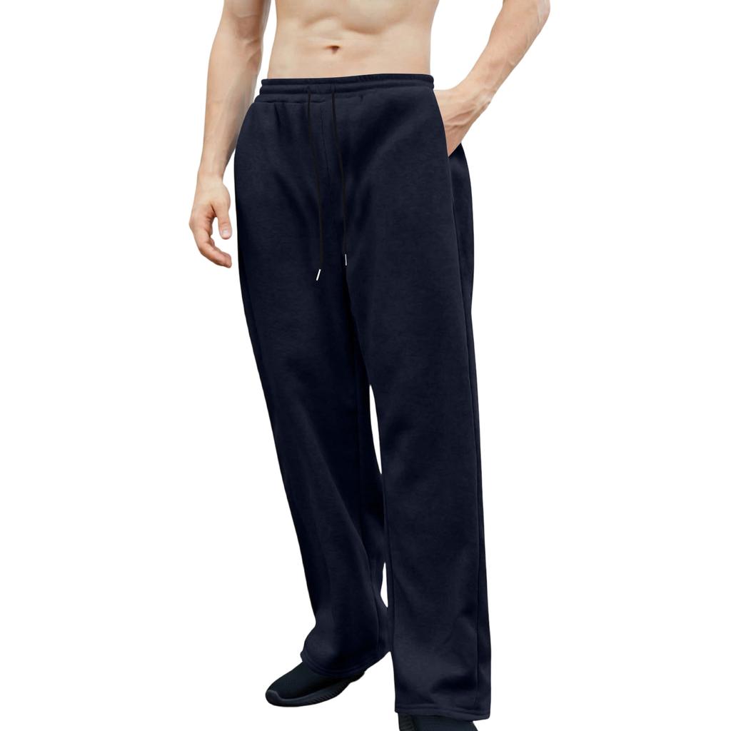 Pánské tepláky s elastickým pasem, rovný a široký střih, volný střih, s kapsami v pase.