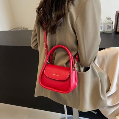 Mångsidig trendväska av årets nya enfärgade bra utseende enkelhet axelväskor avancerad känsla crossbody-väskor