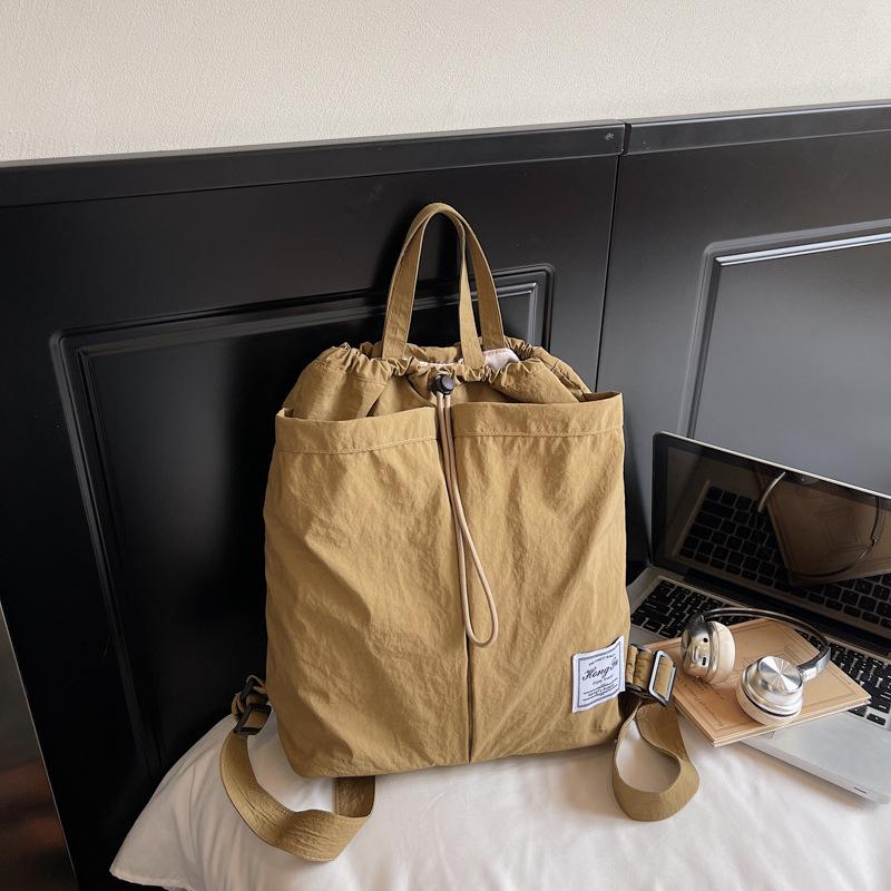 

Японский рюкзак на шнурке, повседневный, брызгозащищенный, тканевый рюкзак высокой ценности, ленивый рюкзак, нейтральный, большой вместимости, школьный рюкзак хаки