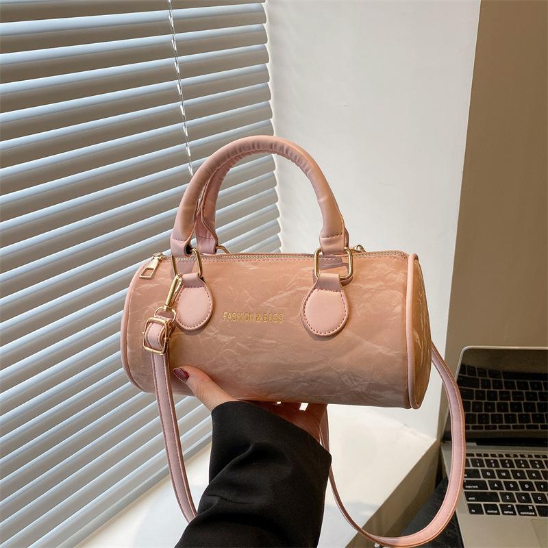 

Нишевый дизайн цилиндрическая сумочка новый темперамент универсальная сумка-мессенджер с высоким чувством свежая и милая сумка на плечо розовый