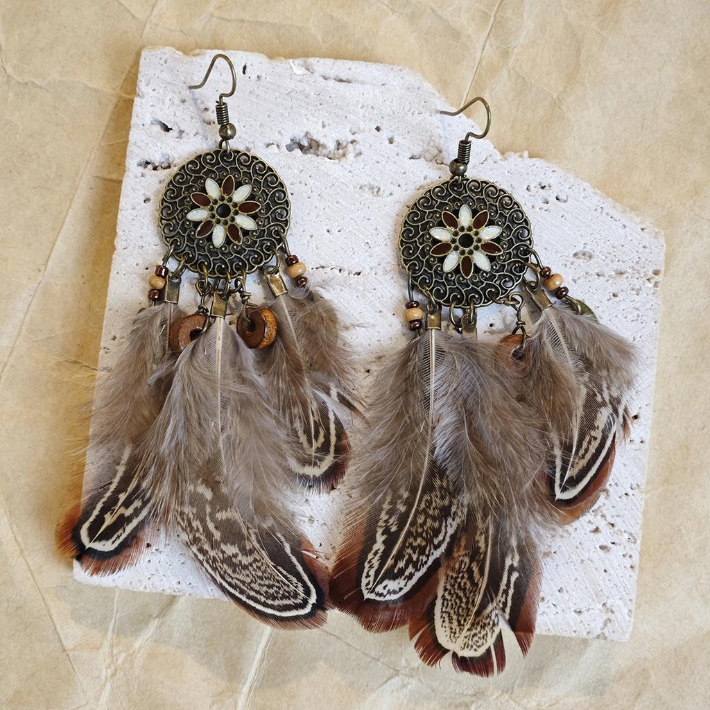Retro ethnic style woven feathers long fringed earrings, bohemian high-end hollow rice bead earrings