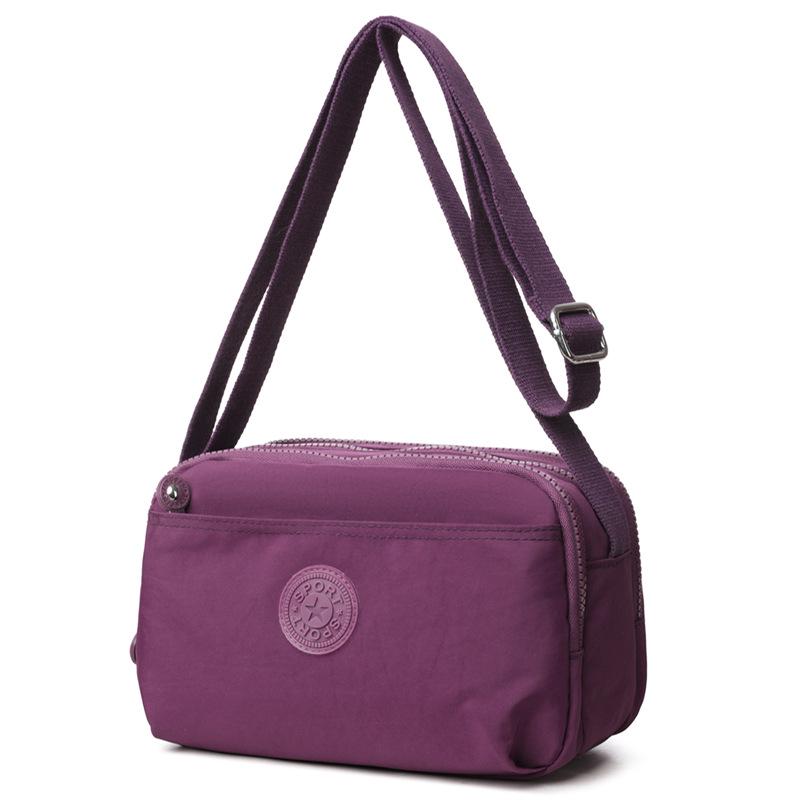 2025 Dámská lehká vícevrstvá vodoodpudivá crossbody taška s více kapsami