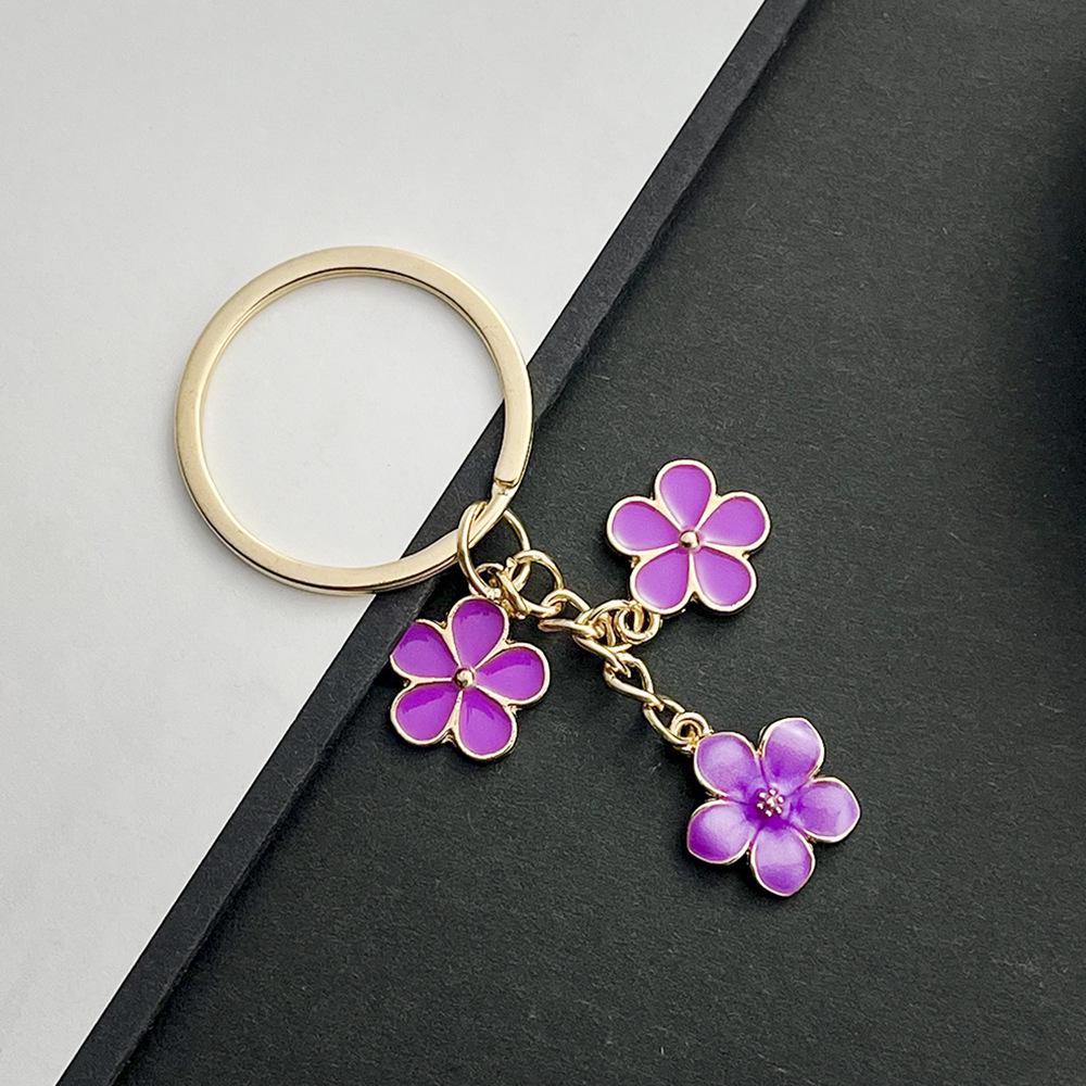 Sakura Oil Drop Keychain – Available in Black, White, Blue, Pink, Purple | Multiple Colors and Metal Parts | Luggage Accessory
