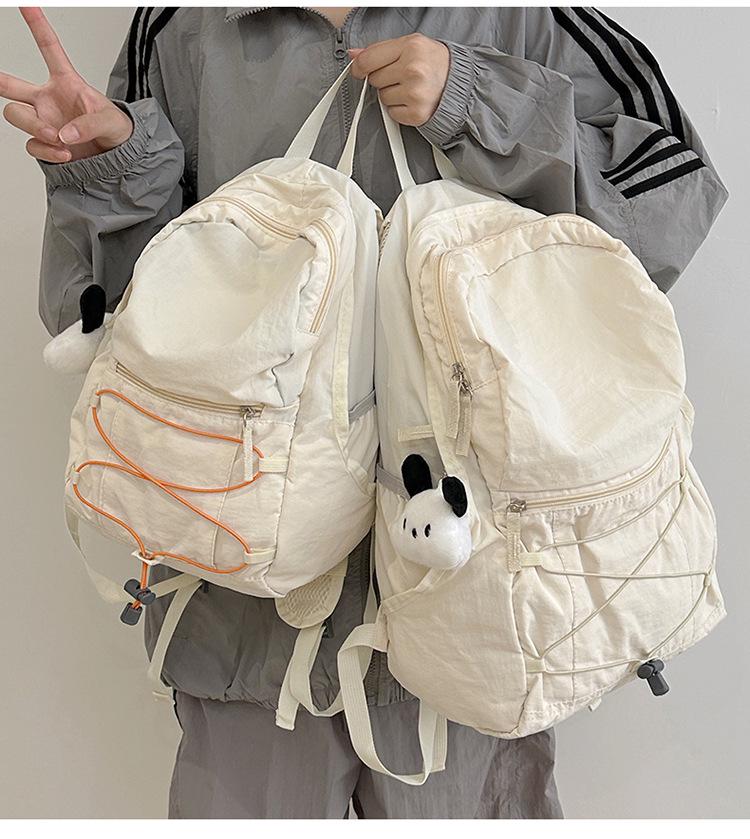 New Style Lightweight Backpack for Junior High Students - Unisex Double Shoulder Bag for Sports, Outdoor, and Mountaineering, Large Capacity.