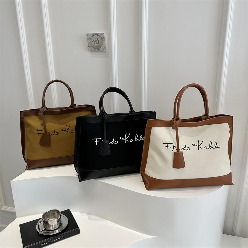 Casual retro high-end portable large-capacity bag women's new trendy fashion contrasting colors commuter hand carry tote bag