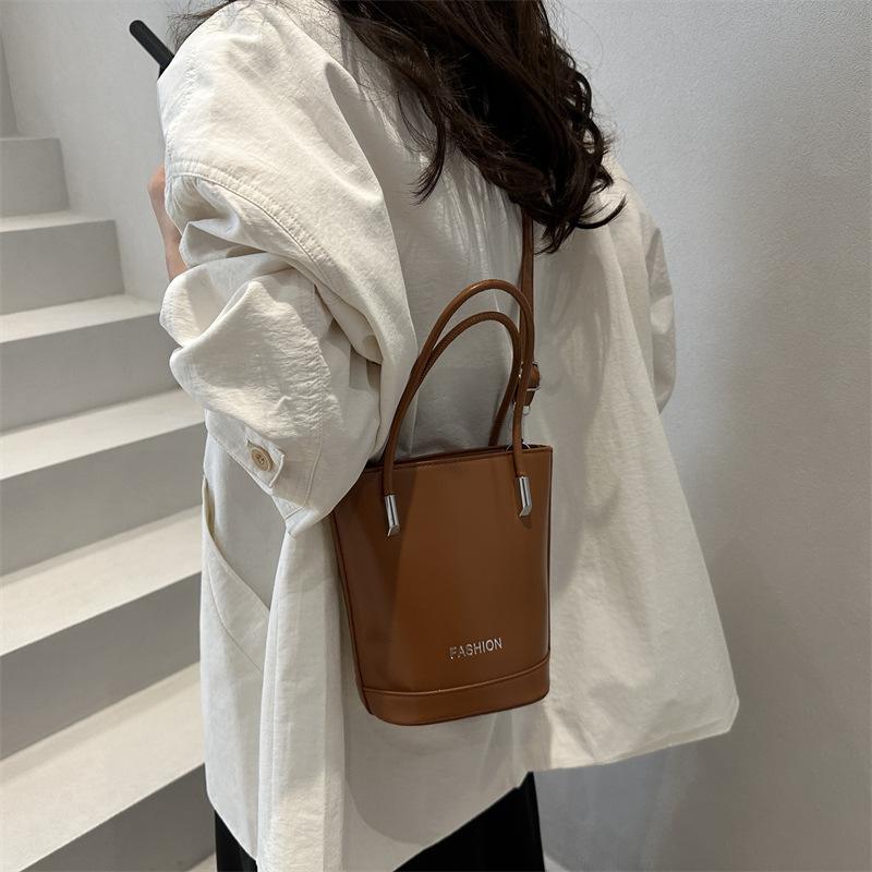 2025 New Texture Korean Solid Color Portable Bucket Bag Exquisite Ou Ruofeng Messenger Bag Fashionable Foreign Style Mobile Phone Bag